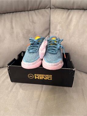 Nike Youth Blue Interior Sneakers with Bright Orange Accent